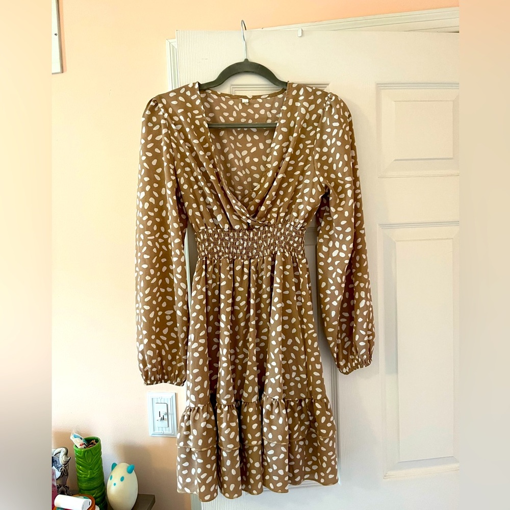 I love this dress, but selling it because it no longer fits!